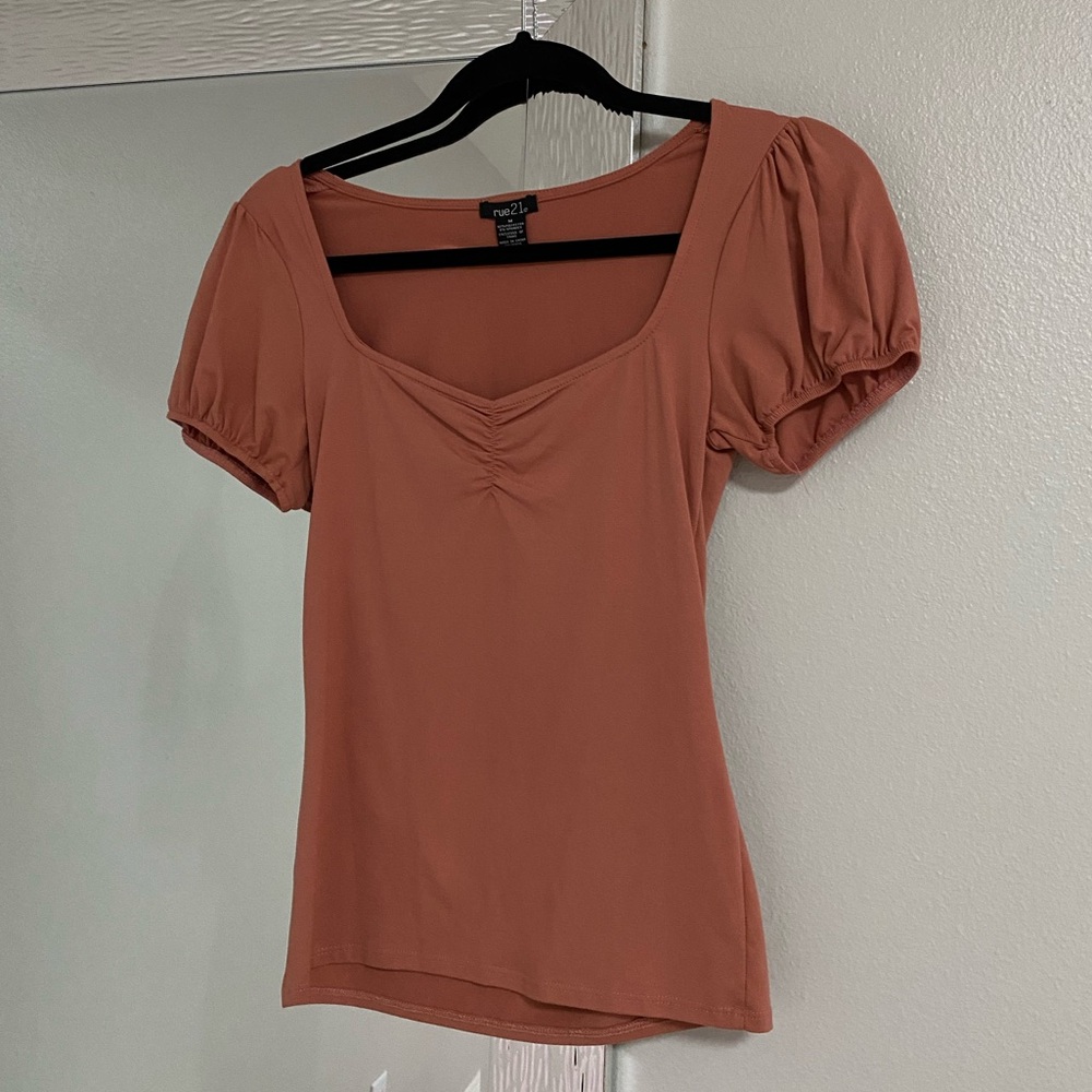 Pink puff sleeve women’s top